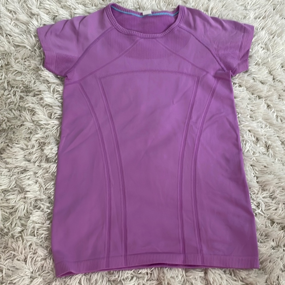 Barely worn I Ivivia tshirt, similar size to a woman’s 2